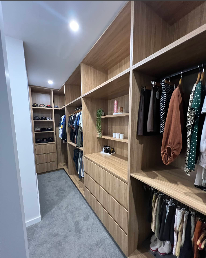 Oak walk-in wardrobe with open shelving